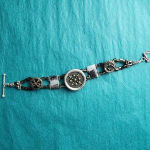 2/15$ Metal bracelet  silver tone and black